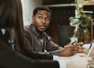 man talking to a woman